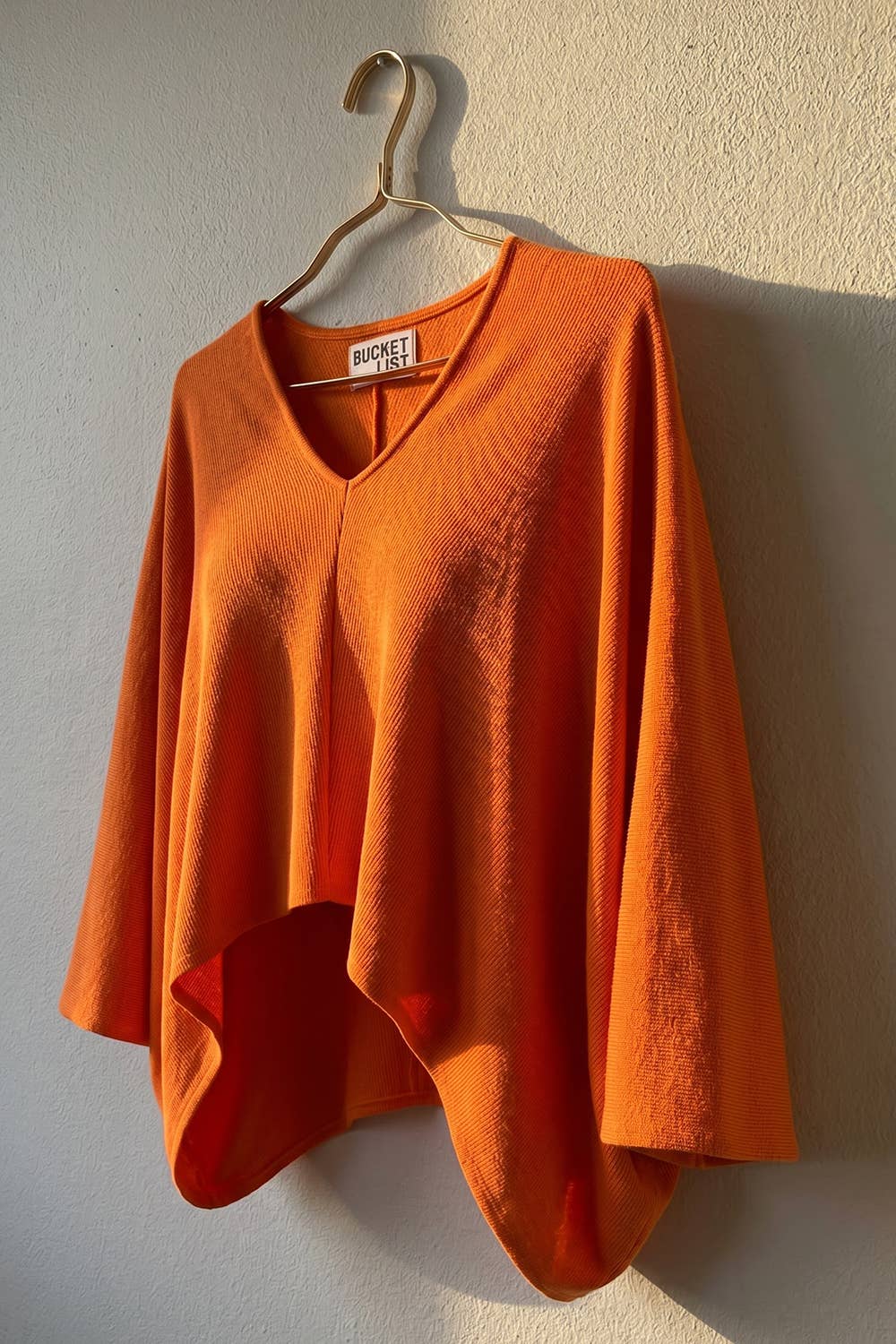 Structured Crepe Asymmetrical Poncho Top: Orange